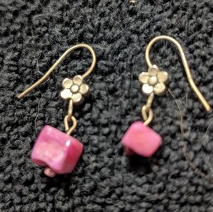 These lovely dangle earrings feature uncut, raw pink gemstone or crystal beads